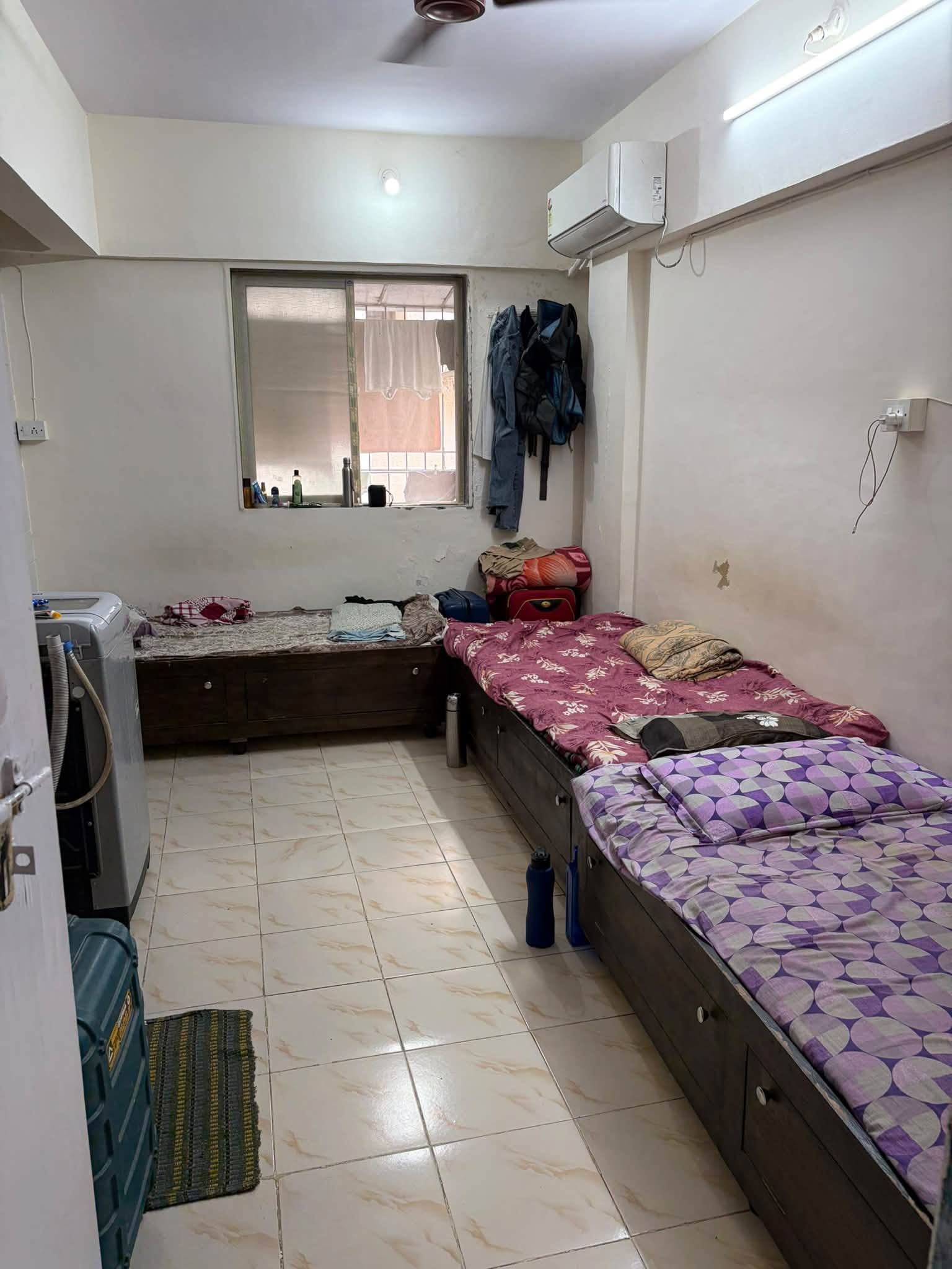 Triple occupancy near DN Nagar Metro Station, Andheri West